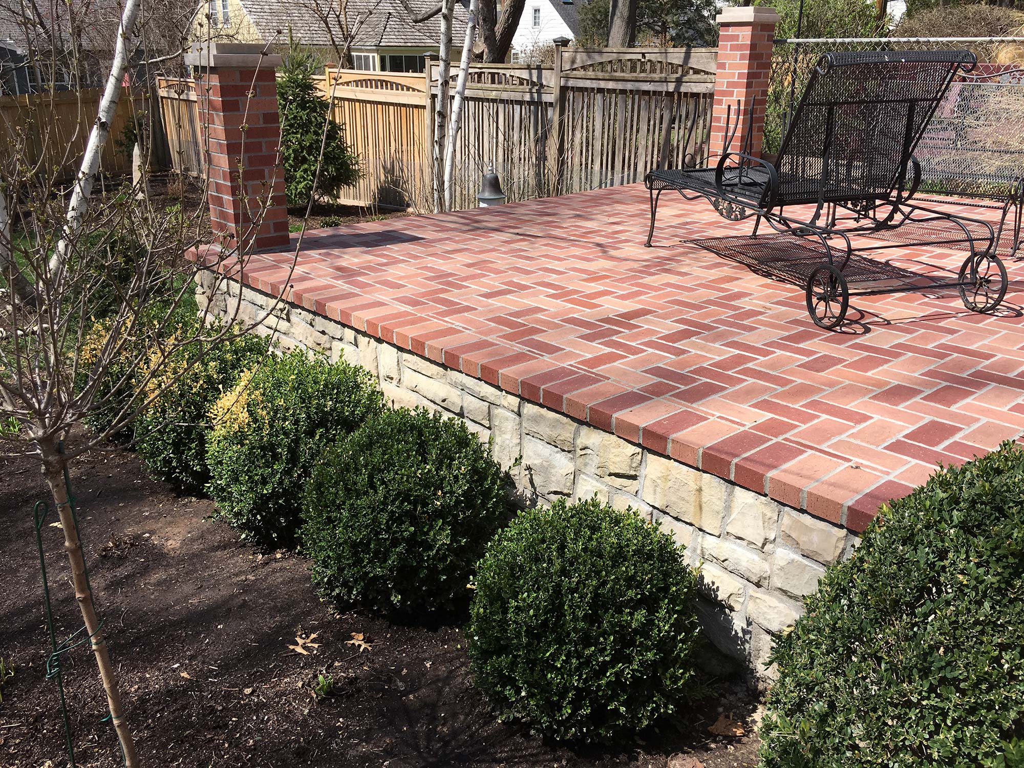 Natural stone patio and steps built by Outlook Hardscape